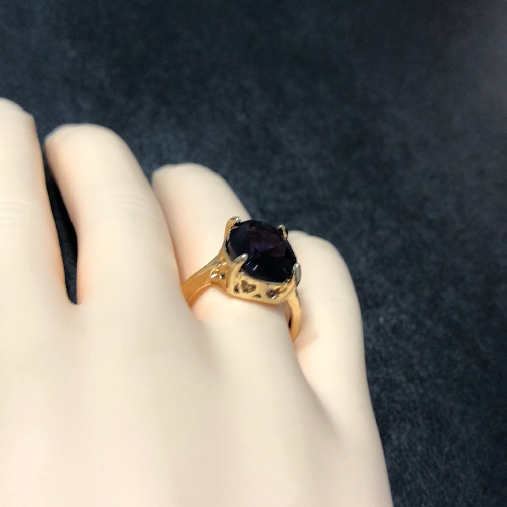 Size 6 gold tone ring w/ large purple stone. - Picture 2 of 4